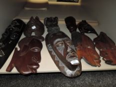 A selection of ethnic hard wood African tribal masks