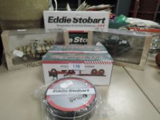 Three Eddie Stobart die cast model trucks and two Atlas military vehicles