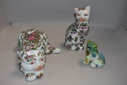 Two 20th century Chinese pottery Famille Rose cat figures with six character marks to base and