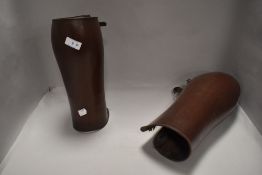 A pair of early to mid 20th century leather gaiters,possibly military.