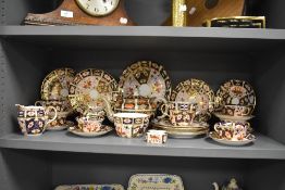 A selection of Royal Crown Derby 2451 Imari pattern teawares, to include teapot, plates, cups,