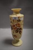 A Victorian Aesthetic Period glass vase, of elongated urn form decorated with flowers against the