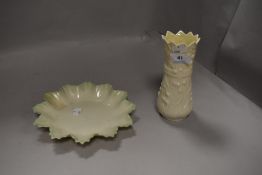 Two pieces of Irish Belleek pottery including star dish and vase