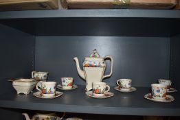 A T.G Green 'Flora' pattern coffee set, comprising coffee pot, sugar, cream and six cups and