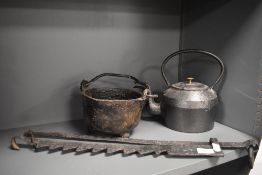 A selection of early cooking hardware including small cauldron, adjustable ingle nook pan holder and
