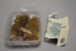 A selection of collectable coins and currency also bank notes