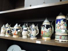 A selection of various German and similar beer or ale steins various makes and marks