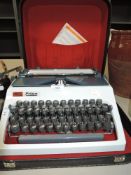 A retro 'Daro Erika' typewriter, with hard case