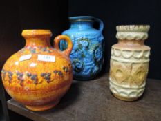 Two West German pottery handled vessels, each with vibrant glaze and sold together with a West