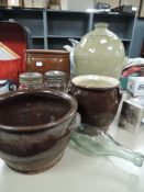 A selection of earthen ware kitchen pottery including large advertising bottle for Ulverston Hudson