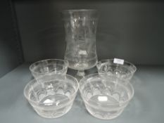 Four fine clear cut crystal glass bowls and similar celery vase