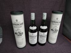 Two bottles of Laphroaig 10 yearold Islay Single Malt Whisky 40% vol 70cl, both in card tubes