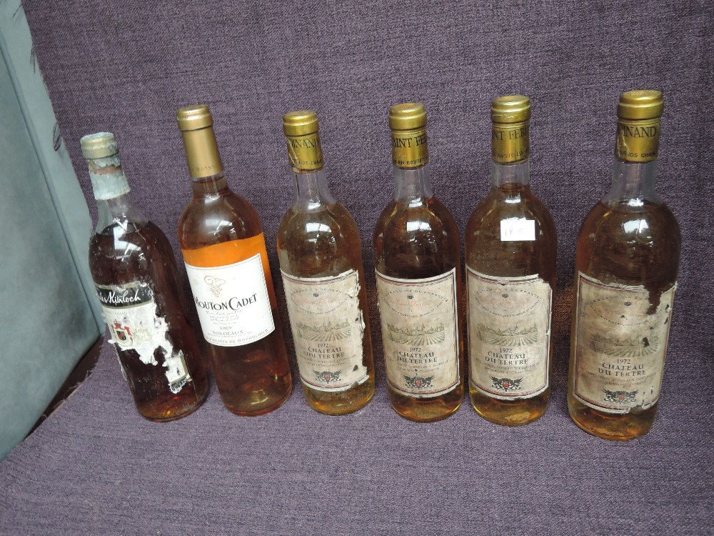 Four bottles of Saint Ferdinand Mis En Outeille Dans Nos Chais Chateaux Du Tertre Bordeaux 1972