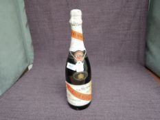 A bottle of GH Munn & Co Cordon Ruge Brut Champagne, 750ml, 12% vol
