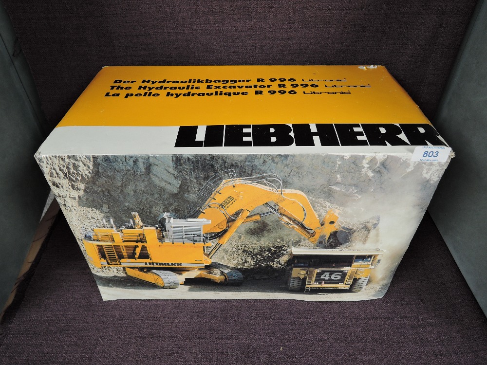 A Conrad 1:50 scale diecasts, Liebherr R996 Litronic Hydraulic Excavator in white, in polystyrene