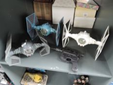 Three original Star Wars Tie fighters including 1973 white and Darth Vaders, Gun also included