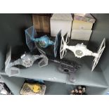 Three original Star Wars Tie fighters including 1973 white and Darth Vaders, Gun also included