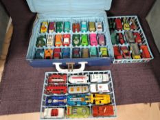 A Matchbox Carry Case containing four original plastic trays carrying 48 Matchbox Lesney and