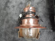 A Gas Oil Lamp from Newcastle Forth Goods Depot, copper and enamel with brass fittings and glass