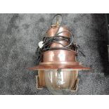 A Gas Oil Lamp from Newcastle Forth Goods Depot, copper and enamel with brass fittings and glass