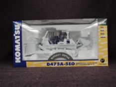 A First Gear 1:50 scale diecast, Komatsu D475A-5EO Crawler Dozer in white, in polystyrene