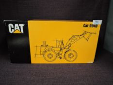 A NZG 1:50 scale diecast, CAT 994D Wheel Loader in white, in polystyrene packaging and in outer card