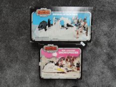 Two Empire Strikes Back box sets including Snow Speeder and Imperial Attack base