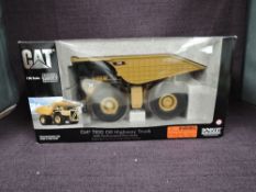 A Norscot 1:50 scale diecast, Cat 793D Off-Highway Truck, in original polystyrene packaging and