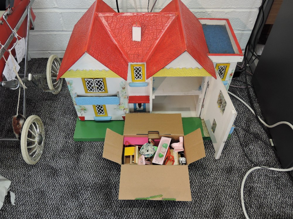 A Conway Valley Two Storey Dolls House containing furniture and fittings