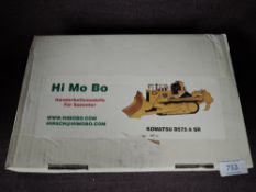 A Hi Mo Bo 1:50 scale white metal model, Komatsu D575 A SR in yellow, in polystyrene packaging and