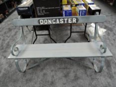 A Railway Station Bench from Donacster Railway Station, with original iron frame and name plate,