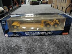 A Norscot 1:50 scale diecast, Towhaul Classic Low Boy Trailer with Caterpillar 784C Tractor, in