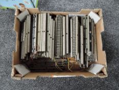 A box containing 150 pieces of Marklin HO Track, straights, approx 24 metres