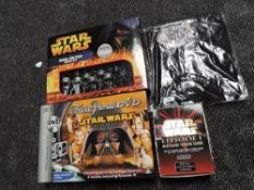 A Star Wars saga edition chess set with Trivial Persuit, Collectors card set and T shirt