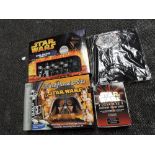 A Star Wars saga edition chess set with Trivial Persuit, Collectors card set and T shirt