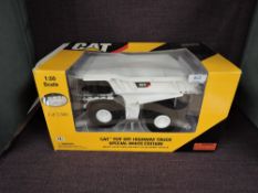 A Norscot Limited Edition 1 of 2500 1:50 scale diecast, CAT 797F Off-Highway Truck Special White