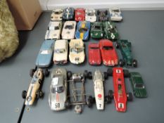 A collection of 1960's Super Shells, Airfix and similar plastic Slot Racing Cars and Chassis, most