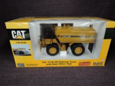 A Norscot 1:50 scale diecast, CAT 777D Off Highway Truck with Klein Water Tank in yellow, in