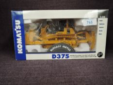 A First Gear 1:50 scale diecast, Komatsu D375 Bulldozer in yellow, in polystyrene packaging and in