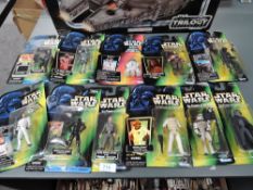 Eleven boxed Star Wars blister packs for the Power of the Force