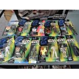 Eleven boxed Star Wars blister packs for the Power of the Force