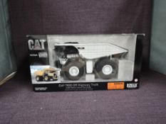 A Norscot 1:50 scale diecast, Cat 793D Off-Highway Truck, in white, in original polystyrene