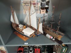 Three wooden modern model Sailing Boats, HMS Victory, Thonier and unnamed, all on wooden stands