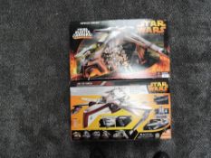 Two boxed Star Wars Revenge of the Sith vehicles ARC-170 and Firing Blaster Cannons