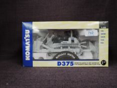 A First Gear 1:50 scale diecast, Komatsu D375 Bulldozer in white, in polystyrene packaging and in