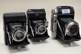 Three folding cameras including two Zeiss Ikon and a Franka Solida III