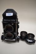 A Mamiya C330 camera with Mamiya Sekor 80mm lens and 65mm lens