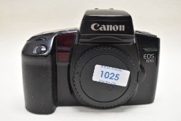 A Canon EOS 100 camera