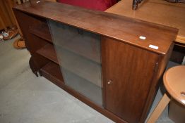 A vintage sapele bookcase with cupboard to side, width approx. 122cm