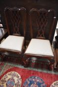 A pair of mahogany Chippendale revival dining chairs